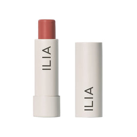 ILIA front packaging of Balmy Tint Hold Me showing warm peachy-nude shade and benefits
