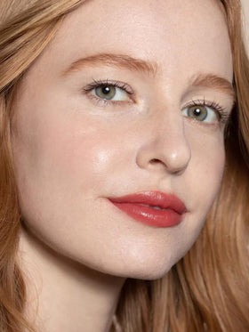 ILIA rosehip seed oil beside the balm highlighting nourishing ingredient benefits