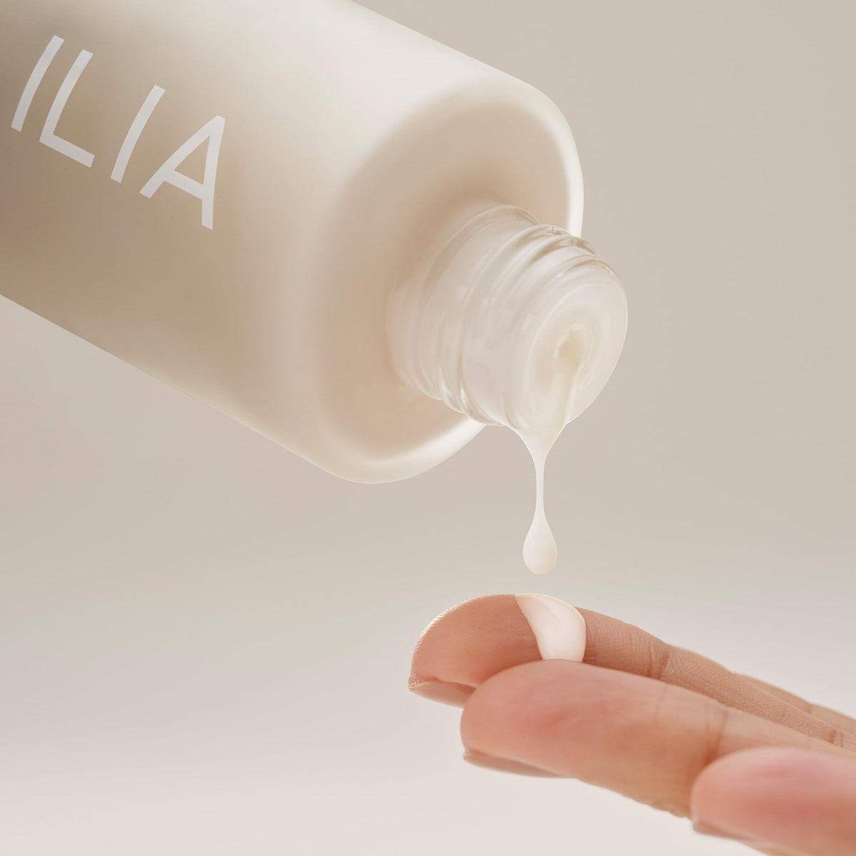 ILIA application before and after on cheek showing visible smoothing benefit