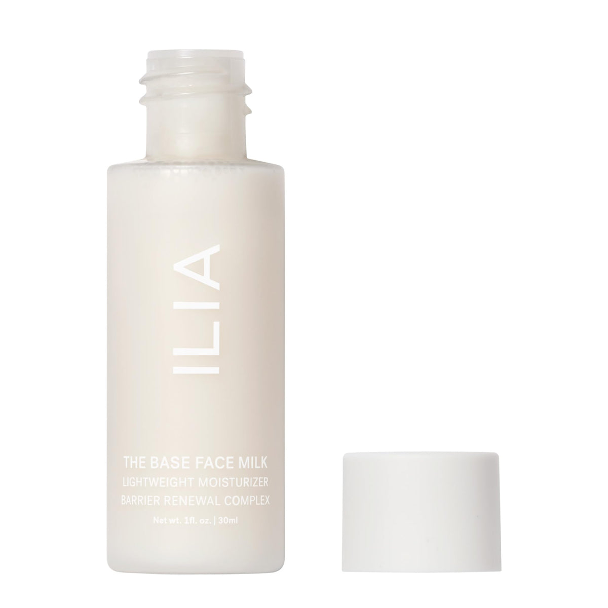 ILIA 30ml bottle beside common objects to show true travel‑size scale
