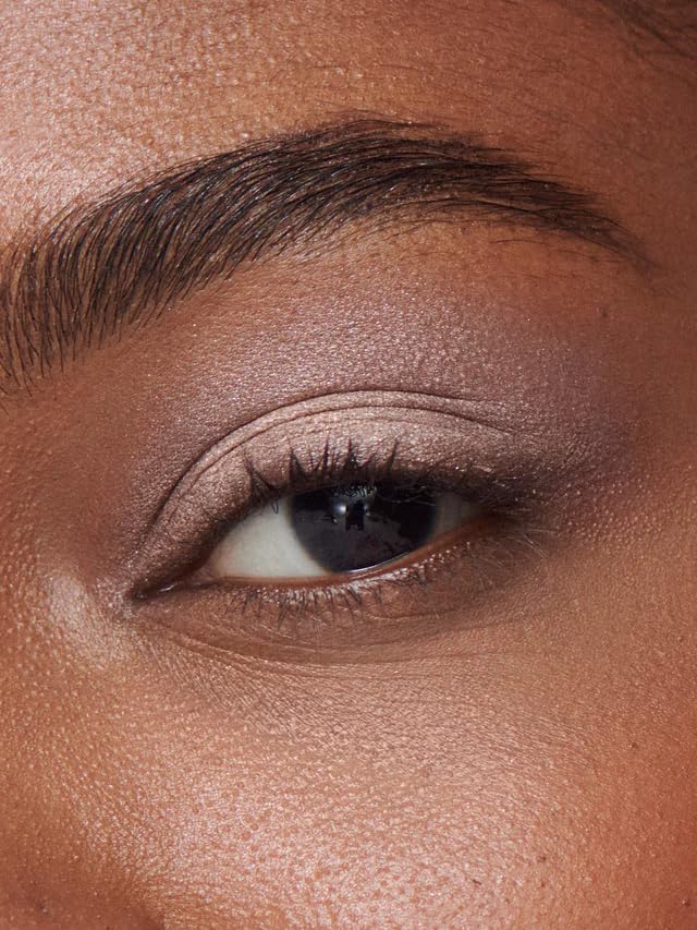 ILIA product applied on model eyelid offering weightless shimmer and photo-ready benefit