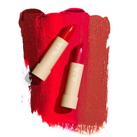 ILIA Color Block Amberlight held in hand to show true size and portable design