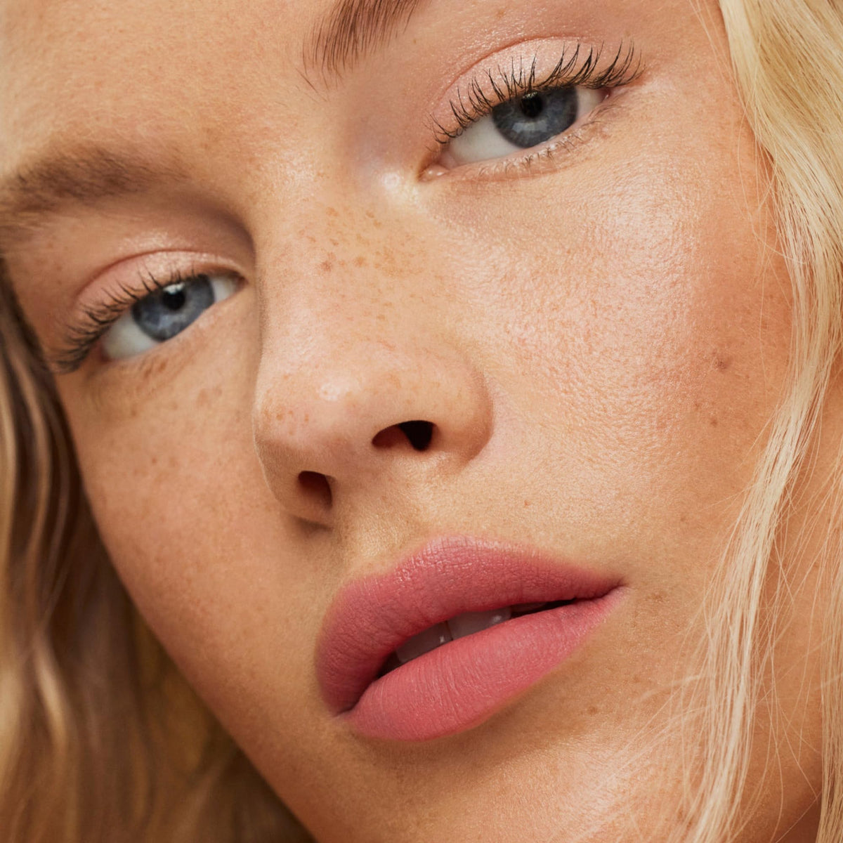 ILIA lip sketch on model application demonstrating buildable pink color and natural look