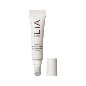 ILIA front packaging of Lip Wrap balm showing sleek tube and branding, travel-ready