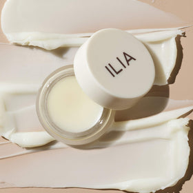 ILIA ingredients flatlay featuring papaya enzyme and hyaluronic acid benefits