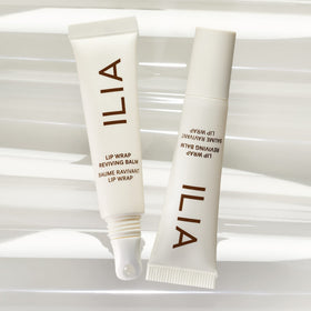 ILIA balm texture swirl on surface illustrating smooth, lightweight consistency