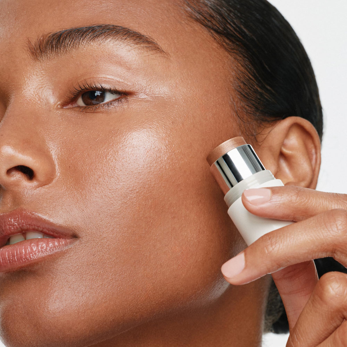 ILIA multi‑stick swiped on lips demonstrating buildable, comfortable color