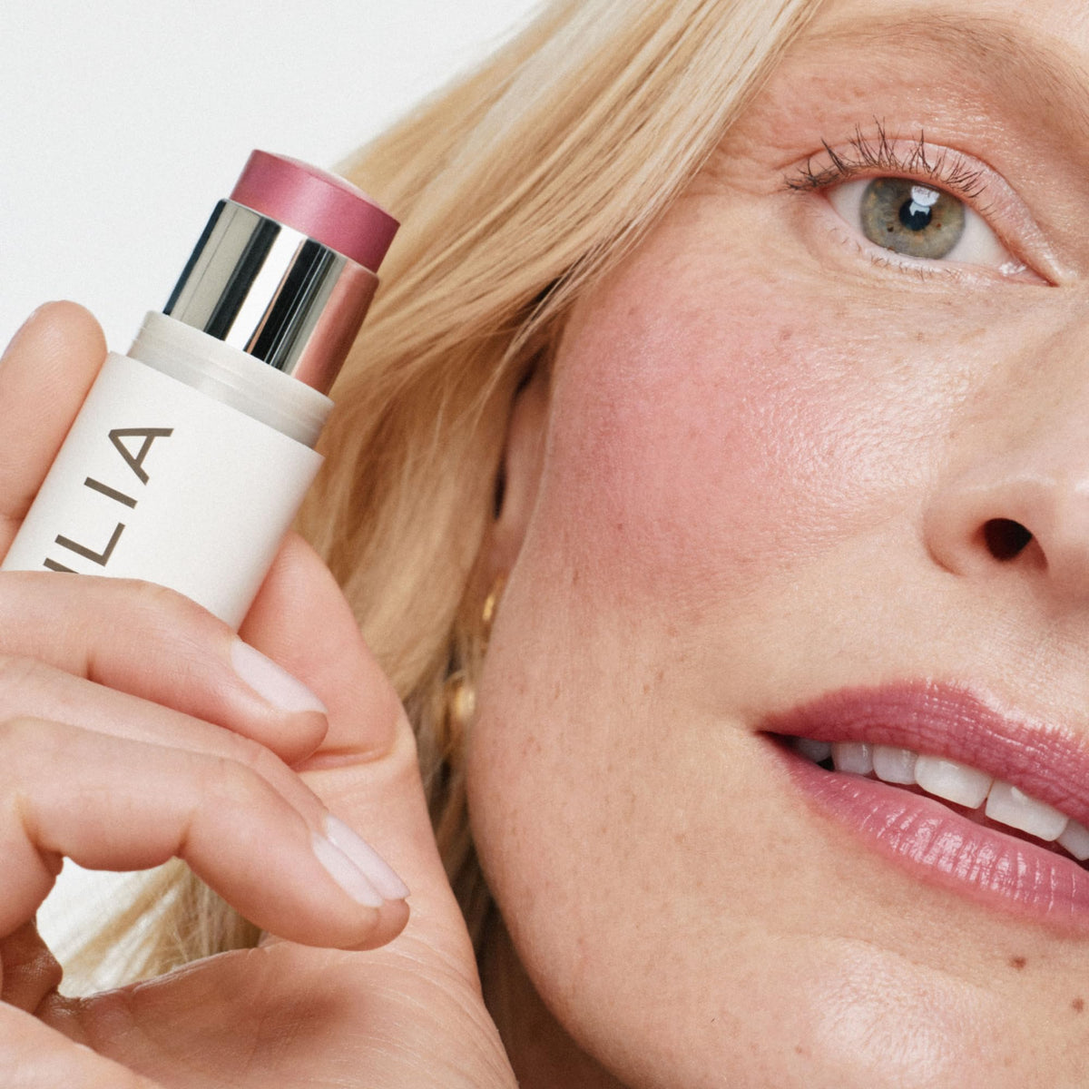 ILIA multi-stick lips close-up showing mauve-rose tint and moisturizing finish