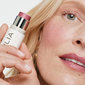 ILIA multi-stick lips close-up showing mauve-rose tint and moisturizing finish