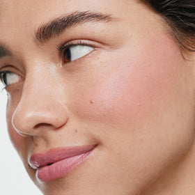 ILIA swatch on skin showing tenderly soft pink texture and blendability