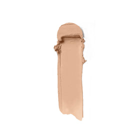 ILIA swatch on arm showing Tupelo shade match and buildable coverage