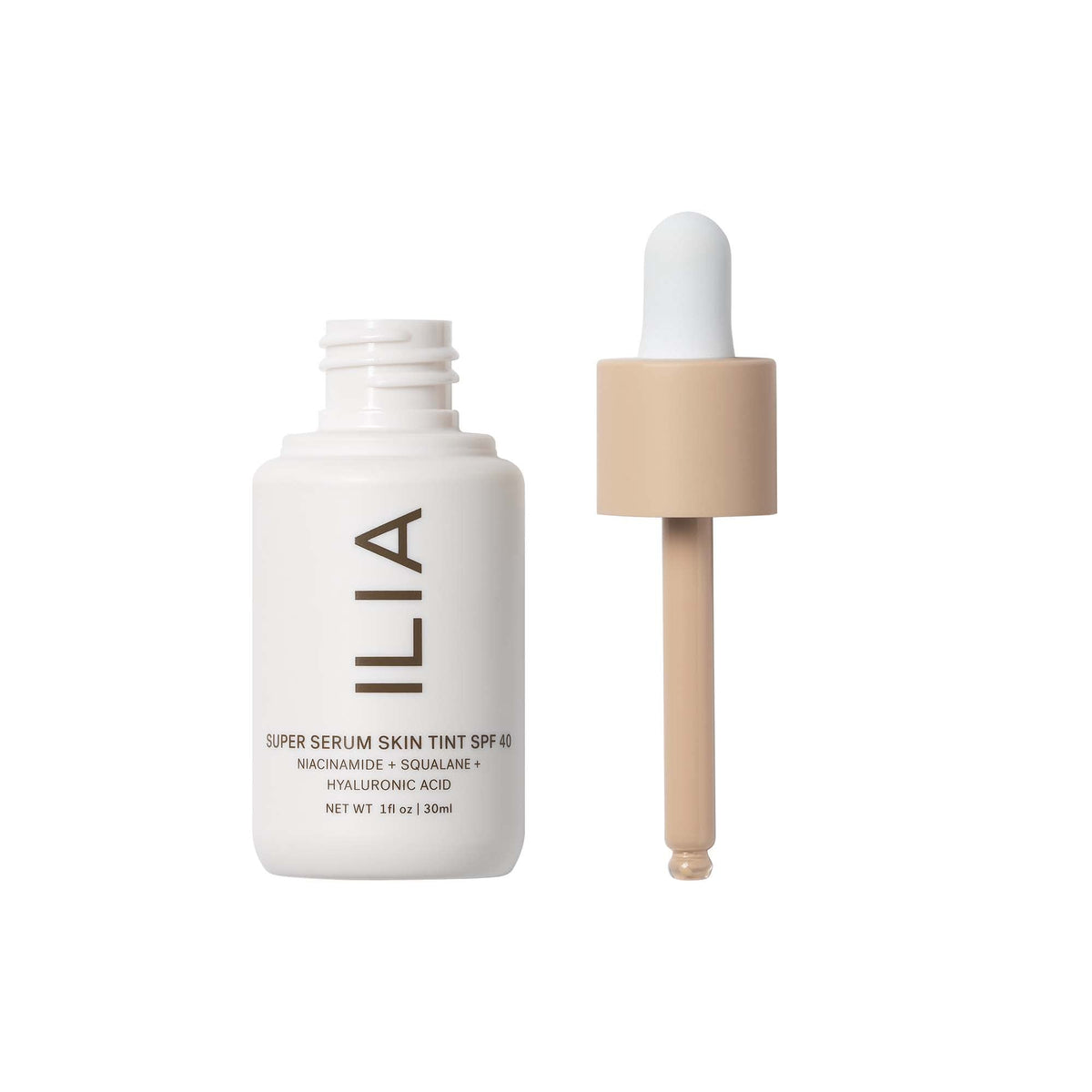 ILIA pump dispenser close-up demonstrating controlled product dispensing