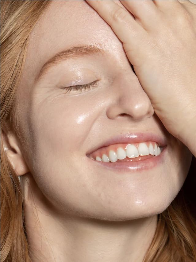ILIA model applying Skye ST.5 showing natural, dewy coverage benefit