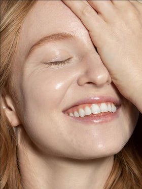 ILIA model applying Skye ST.5 showing natural, dewy coverage benefit