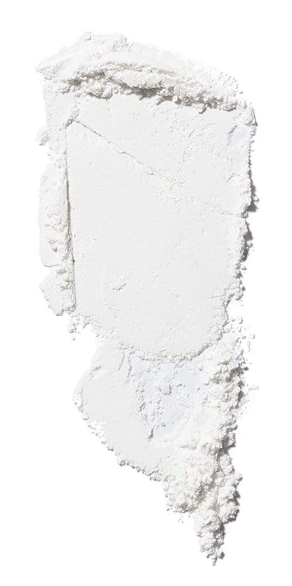 ILIA close-up of powder texture highlighting fine milled particles for blur-effect and smooth skin