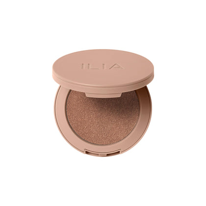 ILIA compact front view showing sleek packaging and clean skincare benefit