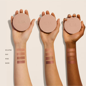 ILIA bronzer applied on cheek demonstrating natural sun-kissed contour benefit