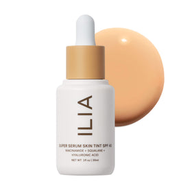 ILIA front bottle of Super Serum Skin Tint Ora ST6 showing sleek packaging and SPF benefit