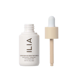 ILIA close-up texture droplet highlighting dewy hydration and smooth finish