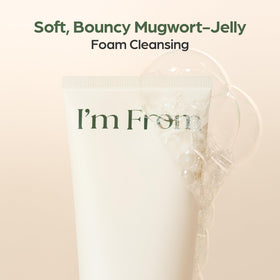 I’m From fresh mugwort leaves beside cleanser showing botanical sourcing benefit