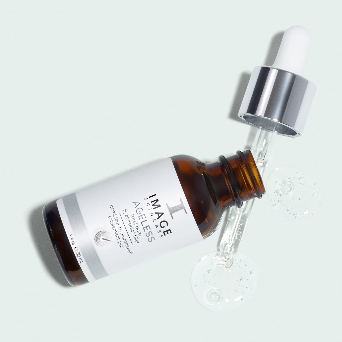IMAGE Skincare bottle staged with morning skincare products for routine layering