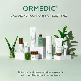 IMAGE Skincare on bathroom vanity in lifestyle scene creating calming routine benefit