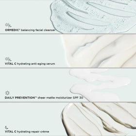 IMAGE Skincare kit held in hand to show travel-size scale and portability benefit