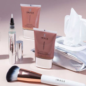 IMAGE Skincare pack held in hand to show scale and travel-friendly compact size