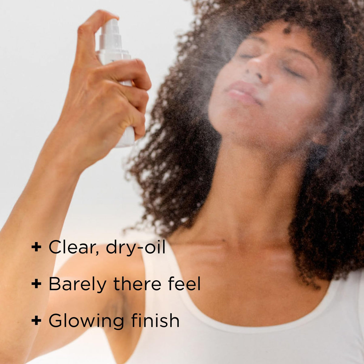 IMAGE Skincare spray nozzle closeup illustrating touchless, even coverage