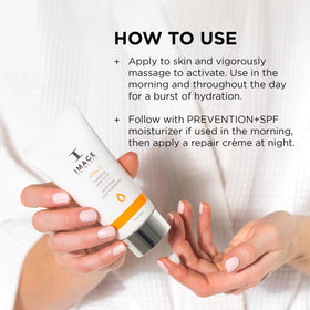 IMAGE Skincare bottle next to a measuring tape to show 2 fl oz size