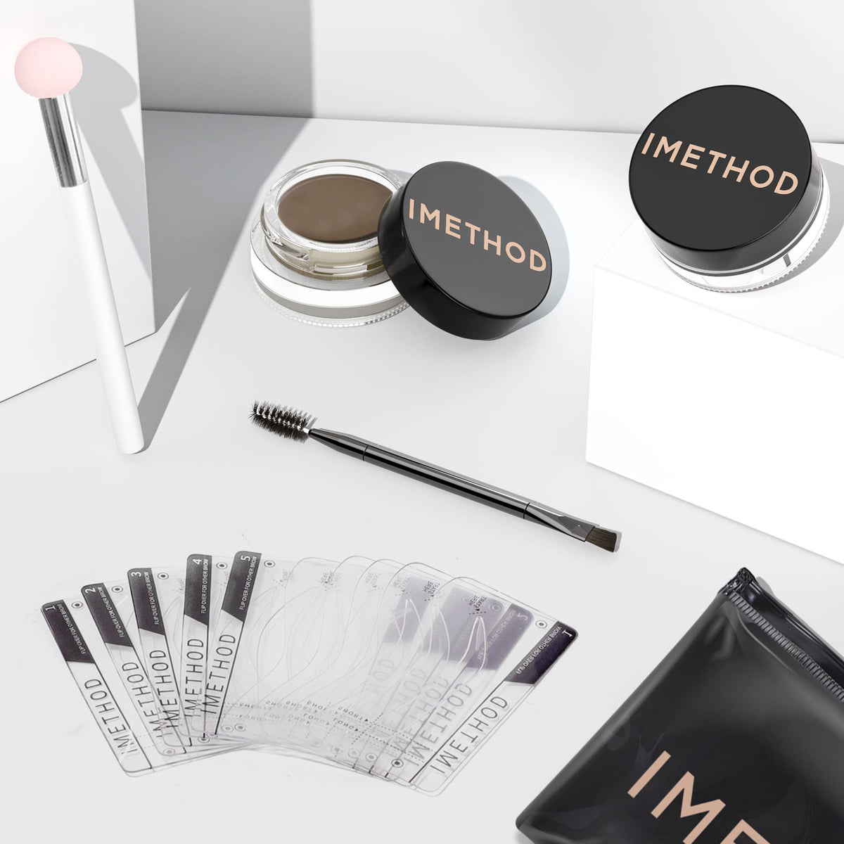 iMethod zippered pouch open with tools arranged highlighting portability and organization