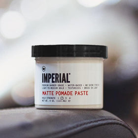 Imperial Barber Grade matte pomade close-up texture showing spreadable paste benefit