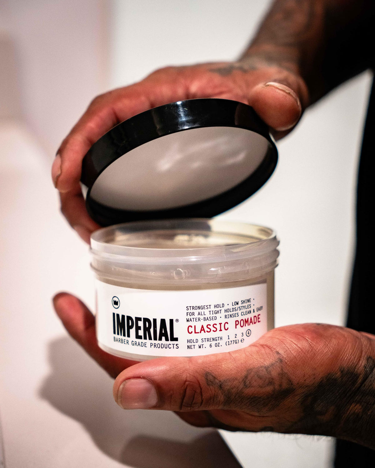Imperial Barber Grade Products styled side part demonstrating low-shine polished finish