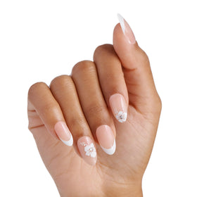 imPRESS close-up showing floral accent details and white French tips for delicate sparkle