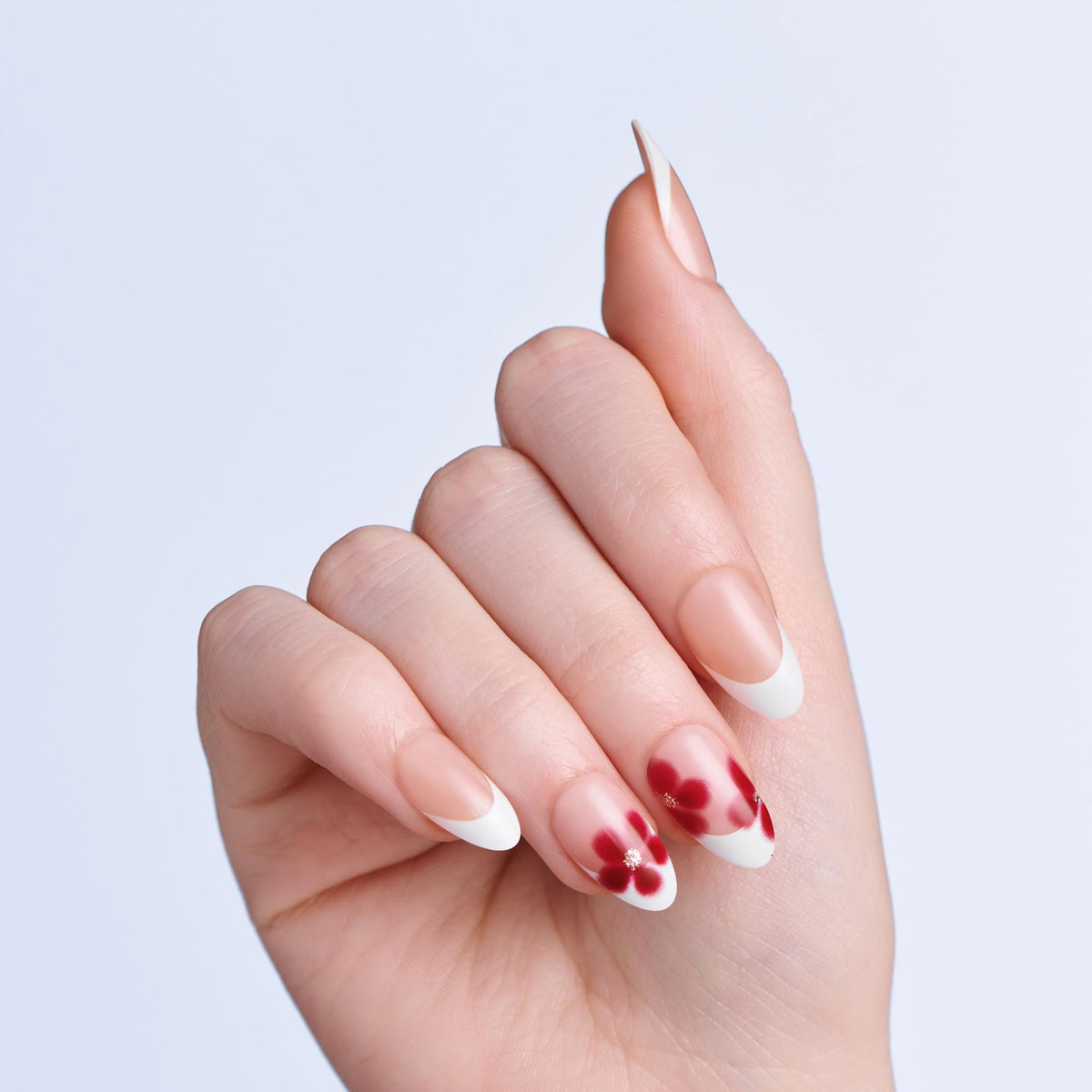 imPRESS close-up of Hampton red floral pattern and gold glitter