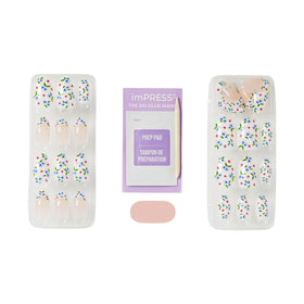 imPRESS kit contents with 30 nails, prep pad, mini file and manicure stick for full at-home set