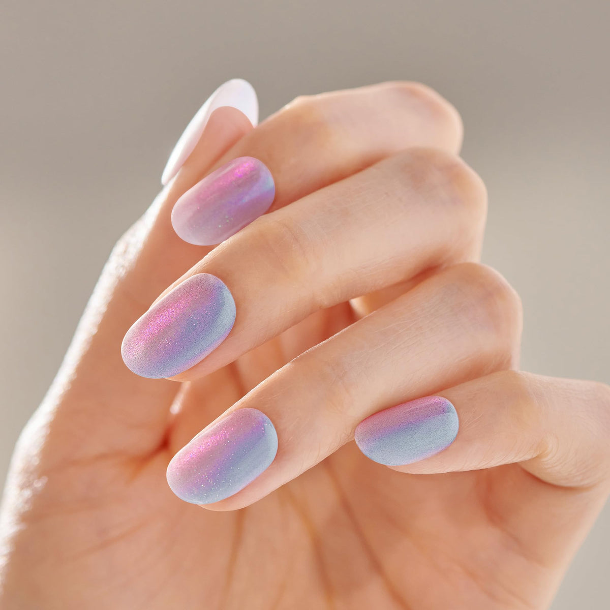 imPRESS Kiss spread of 30 press-on nails displaying multiple sizes for custom fit