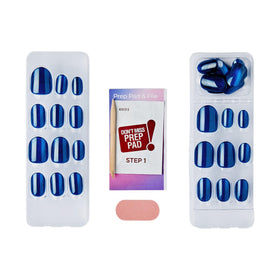 imPRESS kit tools on surface with prep pad, mini file and manicure stick for tidy prep