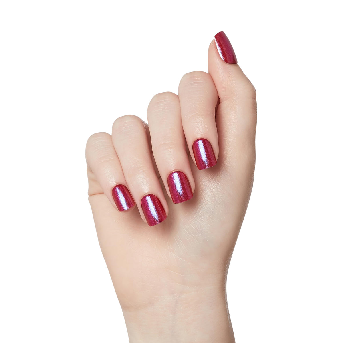 imPRESS hand holding a press-on nail to show scale and instant salon look benefit