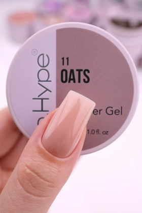 IN.HYPE overlay on natural nail closeup demonstrating strengthened finish