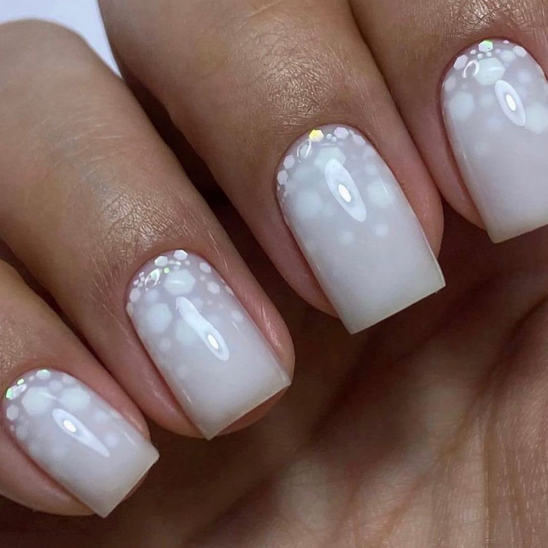 IN.HYPE texture swatch of milky top coat demonstrating sheer coverage and shine