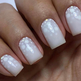 IN.HYPE texture swatch of milky top coat demonstrating sheer coverage and shine