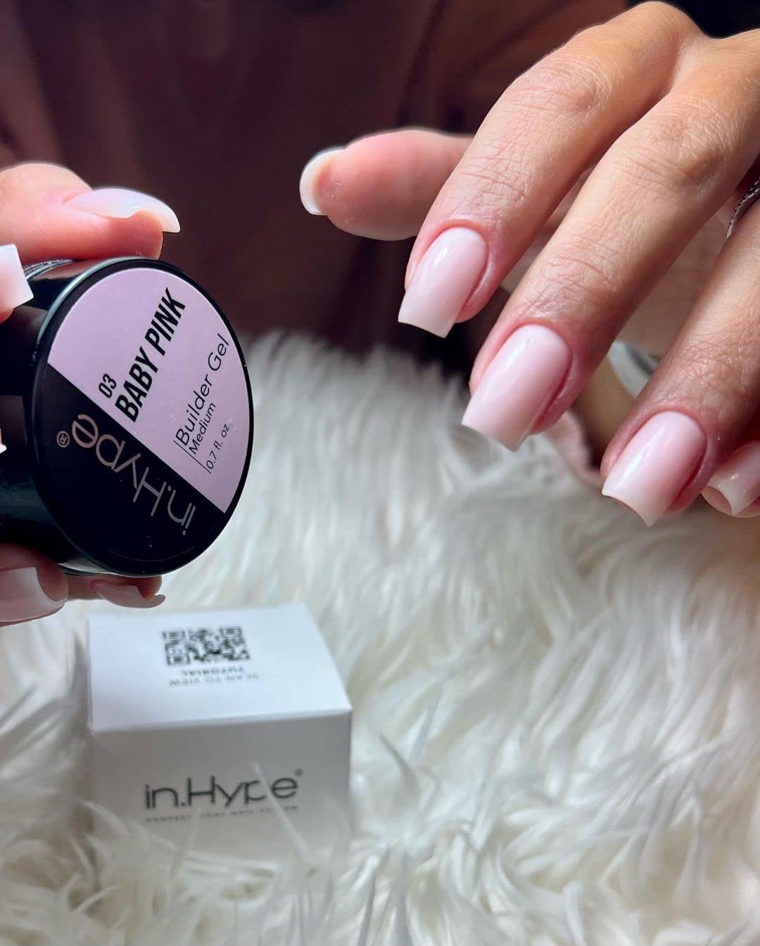 Nail technician applying IN.HYPE gel on form showing professional use and precise shaping benefit