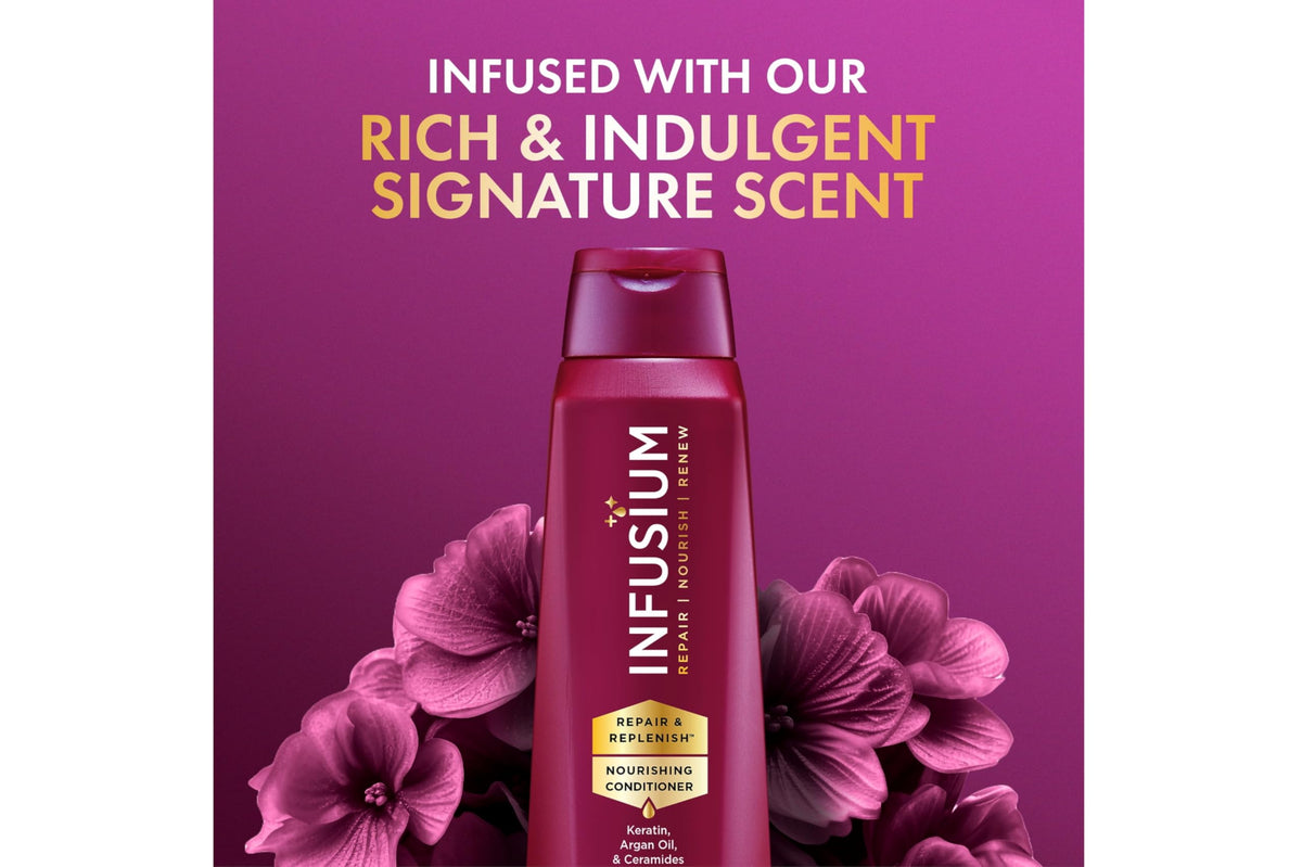 Infusium conditioner cream detail showing thick formula for detangling