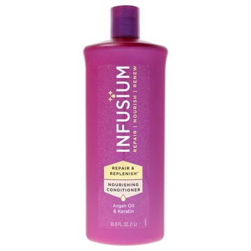 Infusium front packaging 33.8 oz showing label and benefit for repaired hair