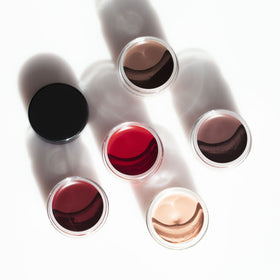 Inglot AMC gel eyeliner jar open with brush showing easy pickup and control benefit