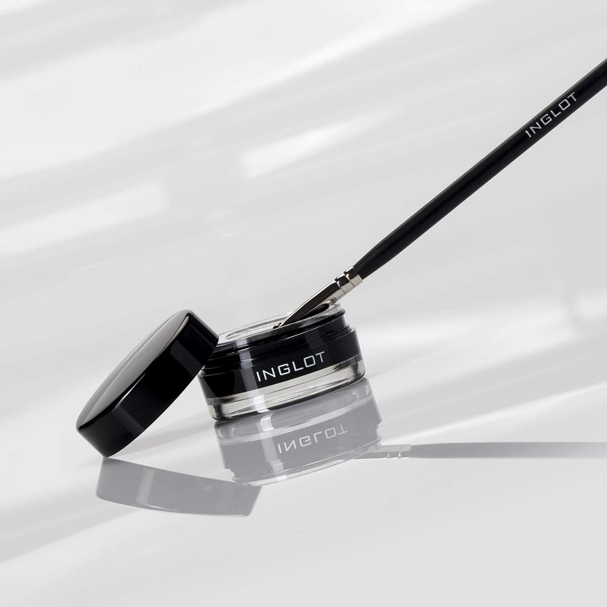 Inglot gel applied with angled brush for precise lines and control