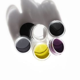Inglot pot next to coin showing 0.19 oz scale for travel convenience