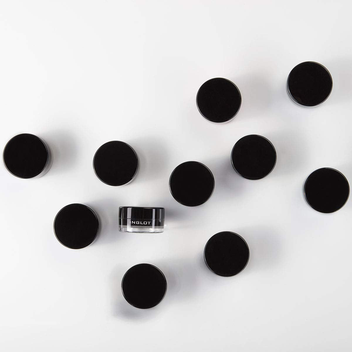 Swatches of Inglot gel on skin demonstrating intense payoff