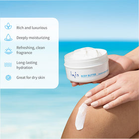 Applying Inis body butter to forearm demonstrating quick absorption benefit
